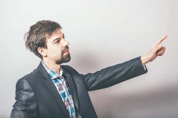 Hombre Muestra Alguien Sobre Fondo Gris — Foto de Stock