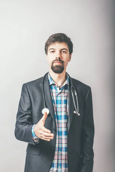 bearded man greets hand