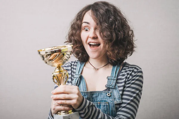 Young Girl Holding Prize Cup Happy — Stock Photo, Image
