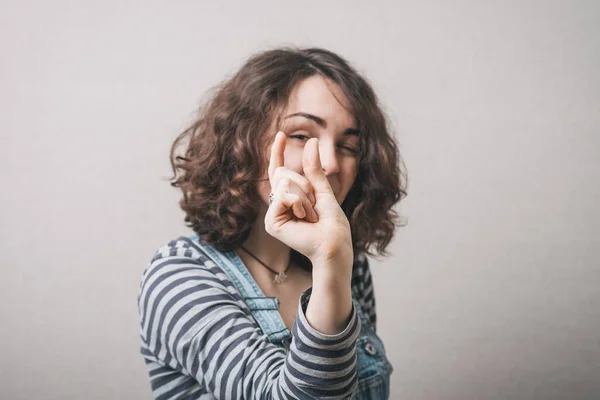 Girl Shows Something Invisible — Stock Photo, Image