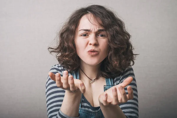 Chica Muestra Algo Invisible —  Fotos de Stock