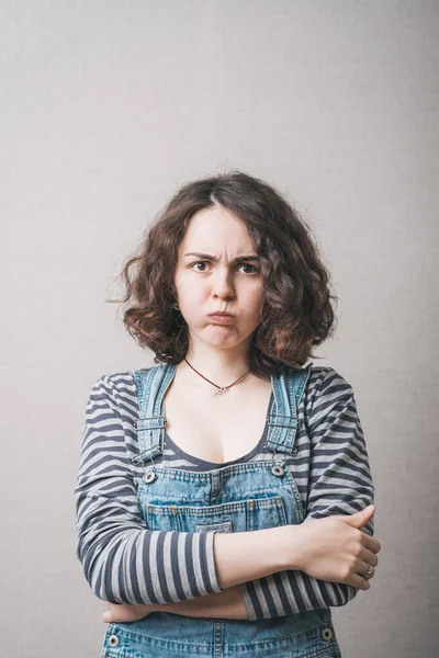 Woman Puffed Out His Cheeks Offended Gray Background — Stock Photo, Image