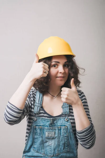 Girl Showing Thumbs Yellow Helmet — Stock Photo, Image