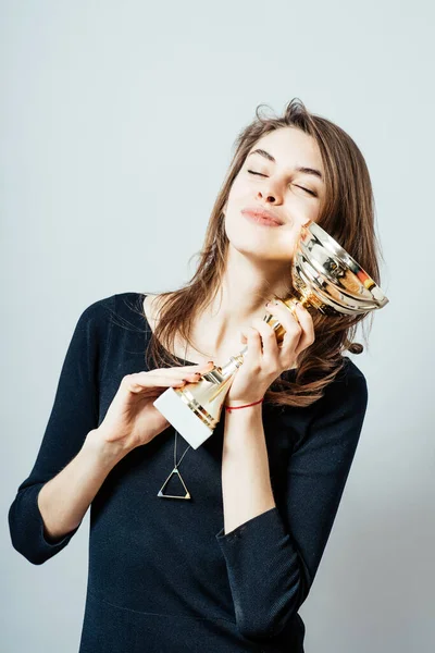 Young Girl Holding Prize Cup Happy — Stock Photo, Image