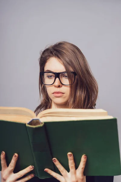 Girl Glasses Reading Book Looking Her — Stock Photo, Image