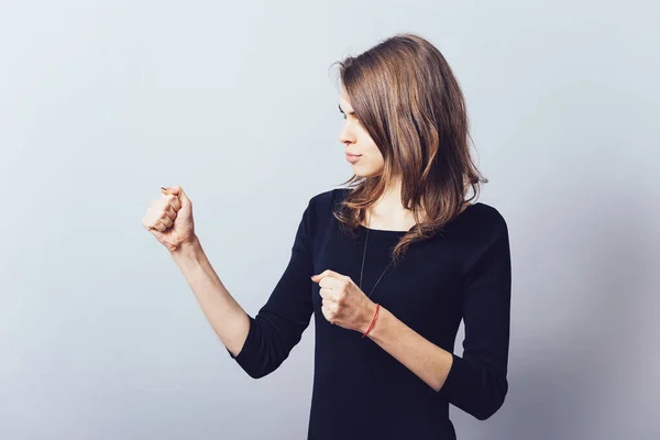 Woman Shows Fists Profile — Stock Photo, Image