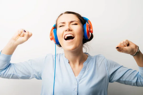 stock image girl in headphones dancing