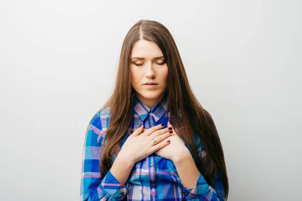 Beautiful Young Woman Her Hands Her Chest — Stock Photo, Image