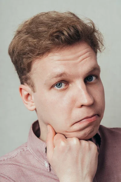 Man Backs His Fist Chin — Stock Photo, Image