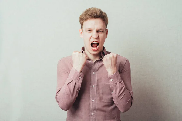 Man Clenches His Fists Shouts — Stock Photo, Image