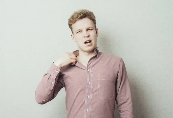 Man Pulls His Shirt Collar — Stock Photo, Image