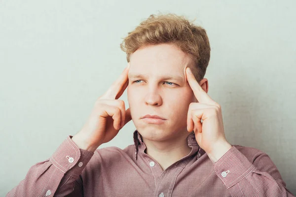 Young Man Holding His Finger His Temple Thinking — Stock Photo, Image