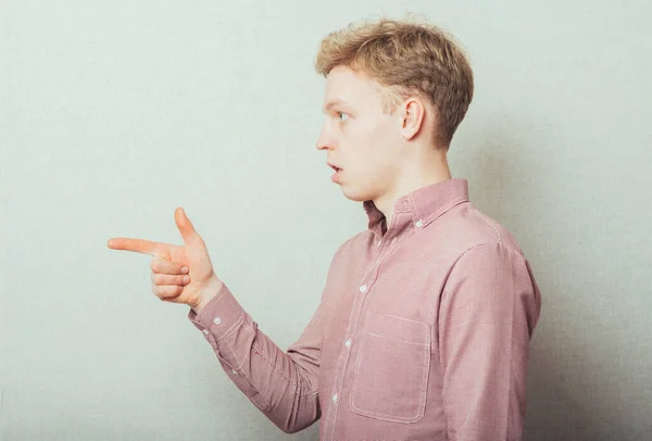Young Man Pointing Someone Gesture Finger — Stock Photo, Image