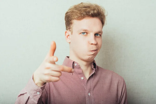 Young Man Pointing Someone Gesture Finger — Stock Photo, Image