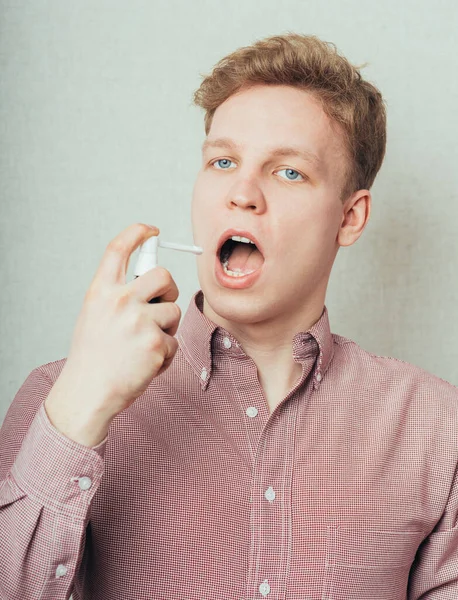 Portrait Young Man Treats His Throat — Stock Photo, Image