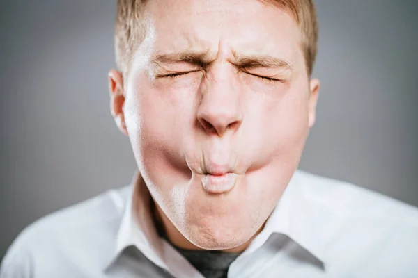 Stressed businessman crazy face expression, isolated