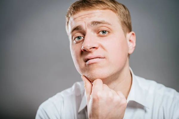 Young Man Thinks Thinks Head Resting His Hand Looking Camera — Stock Photo, Image