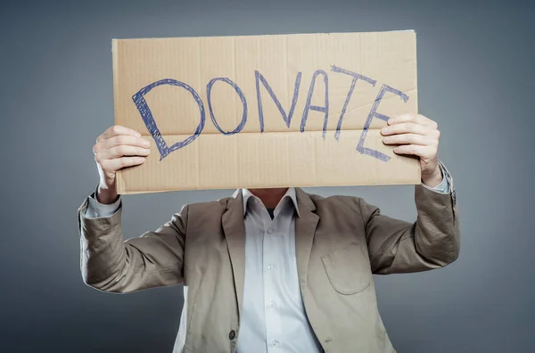 Man Met Kartonnen Tekst Een Donatie — Stockfoto