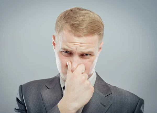 Jonge Zakenman Dicht Zijn Neus Grijpen Met Zijn Vingers — Stockfoto