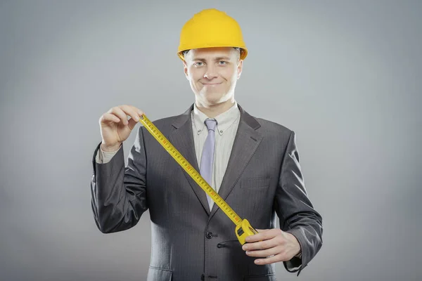 Young Builder Yellow Tape Measure — Stock Photo, Image
