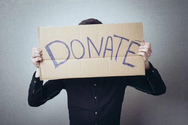 Man Inscription Cardboard Donate — Stock Photo, Image