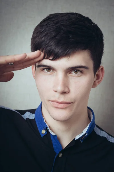 Man Salutes His Hand His Temple — Stock Photo, Image