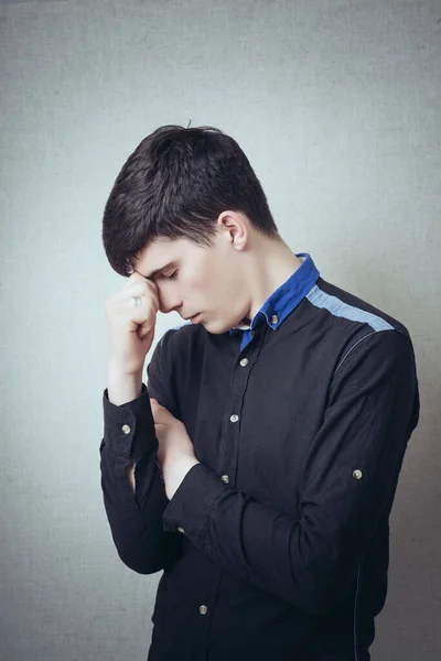 Man Sadness Lowered Head Hand Face Gesture Gray Background — Stock Photo, Image