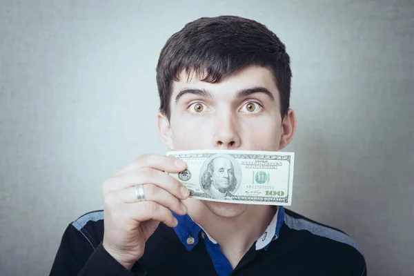 Man 100 Dollar Banknote His Mouth Gray Background — Stock Photo, Image