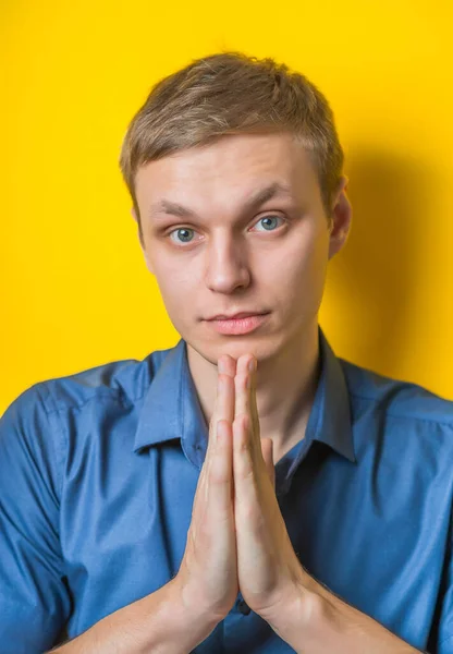 Portrait Handsome Young Man Praying Thinking Isolated Yelllow — Stock Photo, Image