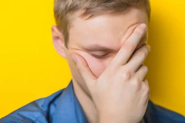 Close Sad Casual Young Man Hands His Face Home — Stock Photo, Image