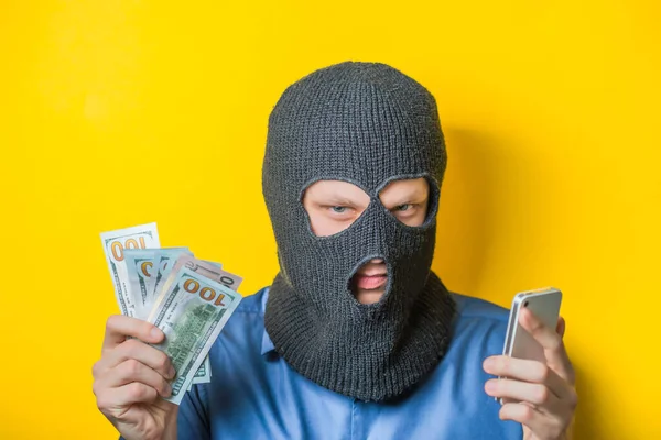 Man Close Thief Mask Blue Shirt Yellow Background Looking Slyly — Stock Photo, Image