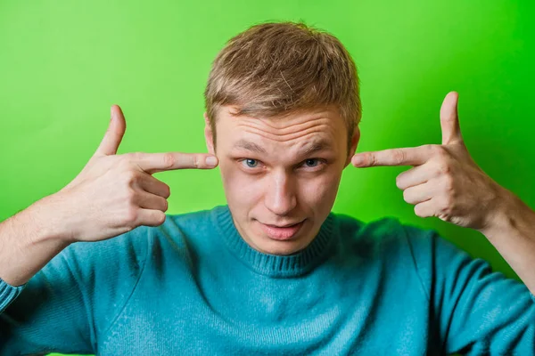 Young Man Gesturing Fingers His Temple You Crazy — Stock Photo, Image