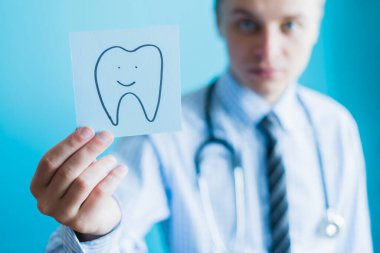 Elinde ikon dişi var.