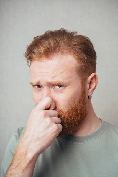 Man Disgusted Expression Closing His Nostrils His Fingers — Stock Photo, Image