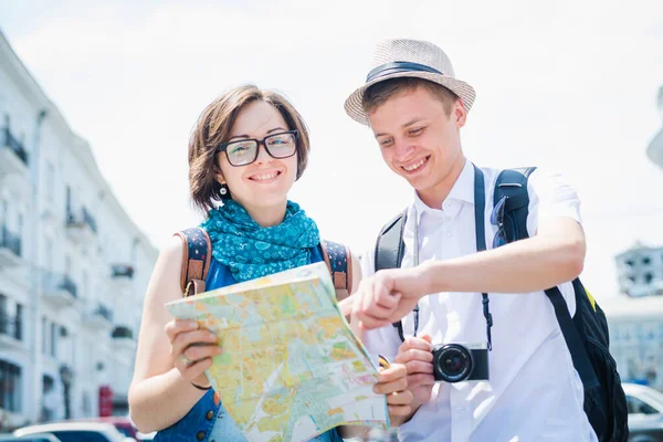 tourists with map, travel concept