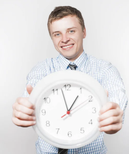 Hombre Negocios Descontento Sosteniendo Reloj Pared —  Fotos de Stock