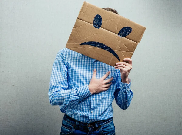 Mann Som Holder Den Triste Smiley – stockfoto