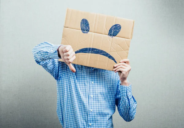 Mann Som Holder Den Triste Smiley – stockfoto