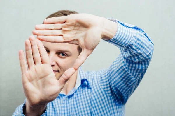 Hombre Haciendo Mano Marco — Foto de Stock