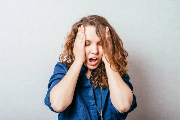 Woman Holds Her Hands Her Head Shouting Discontent Headache Gray — Stock Photo, Image