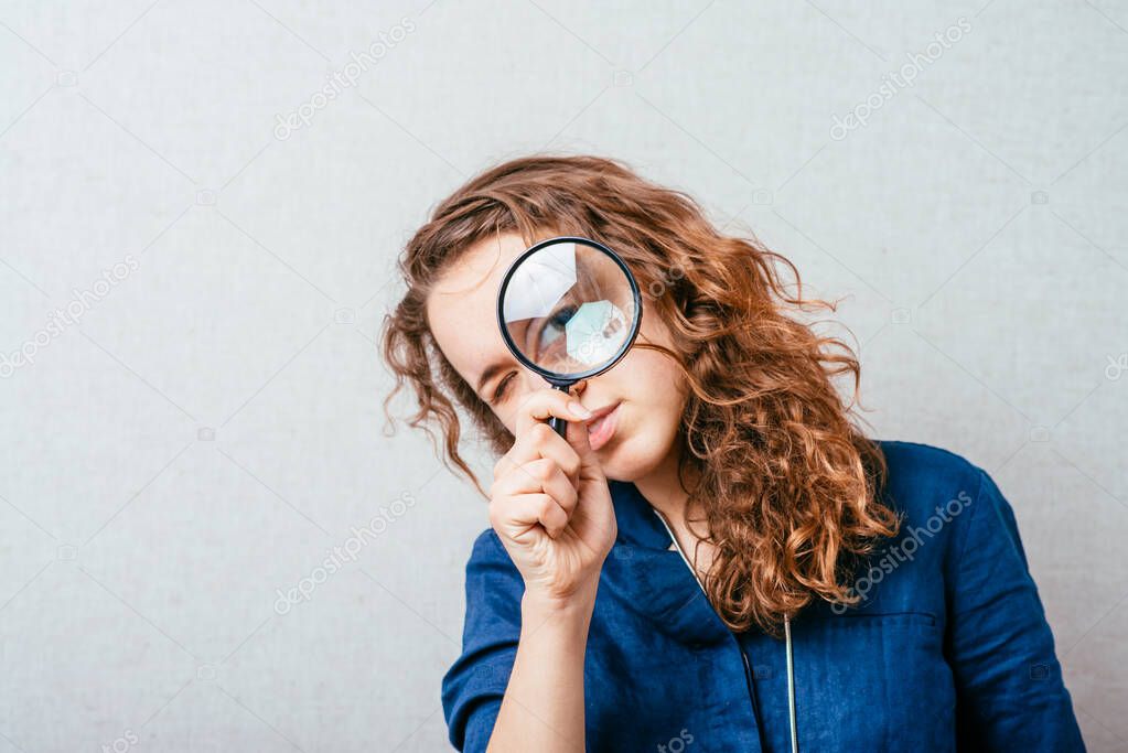 girl with a magnifying glass