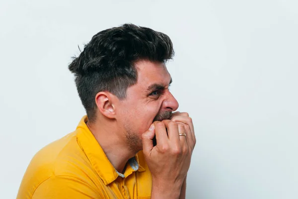 Man Bites His Nails — Stock Photo, Image