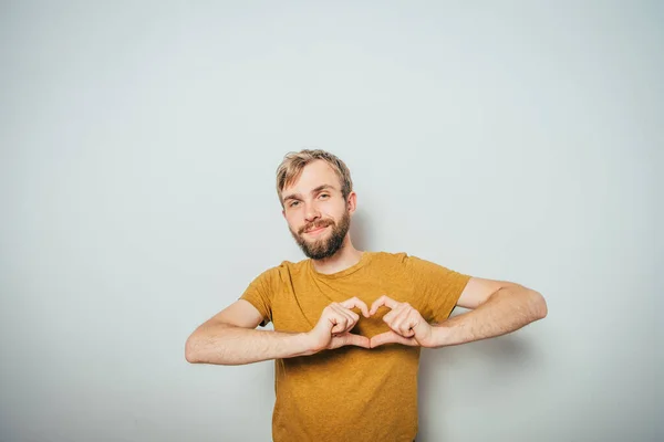 Άνθρωπος Που Κάνει Ένα Πλαίσιο Καρδιά Χέρι — Φωτογραφία Αρχείου