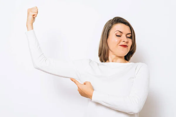 Woman Showing Her Muscles — Stock Photo, Image