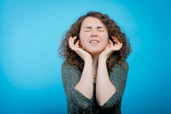 stock image Close ears woman against studio background