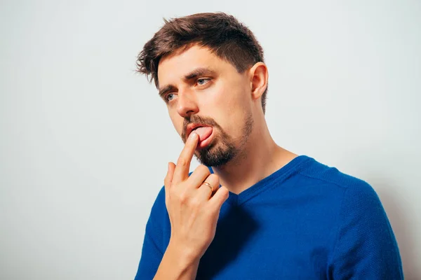 Man Shows His Finger Tongue — Stock Photo, Image