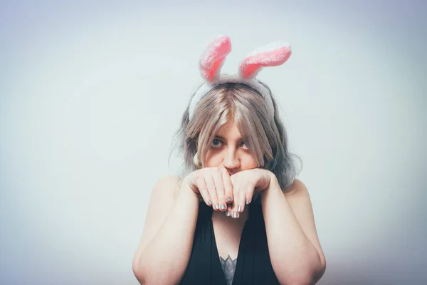 Portrait of girl with white rabbit ears