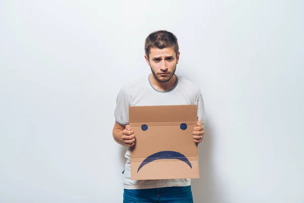 Homem Segurando Uma Foto Com Sorriso Infeliz — Fotografia de Stock