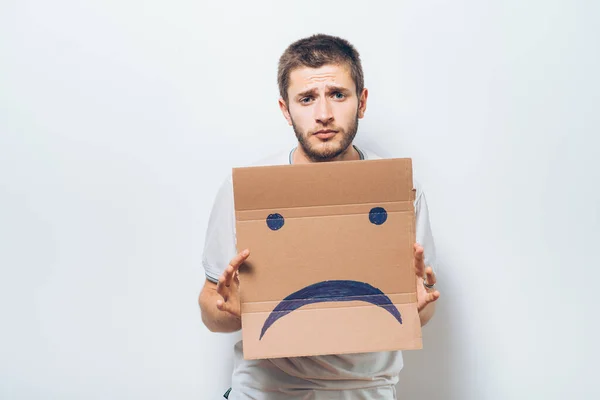 Homem Segurando Uma Foto Com Sorriso Infeliz — Fotografia de Stock