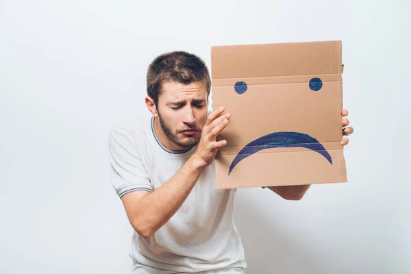 Homem Segurando Uma Foto Com Sorriso Infeliz — Fotografia de Stock